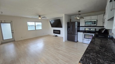 This tastefully renovated 1 bed/1.5 bath corner unit in Kings on Kings Point Golf -Flanders Way in Florida - for sale on GolfHomes.com, golf home, golf lot