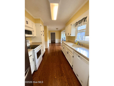 Welcome to this well-located, 4 bedroom 2.5 bath home nestled in on Scotch Meadows Country Club in North Carolina - for sale on GolfHomes.com, golf home, golf lot