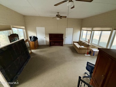 Welcome to this well-located, 4 bedroom 2.5 bath home nestled in on Scotch Meadows Country Club in North Carolina - for sale on GolfHomes.com, golf home, golf lot