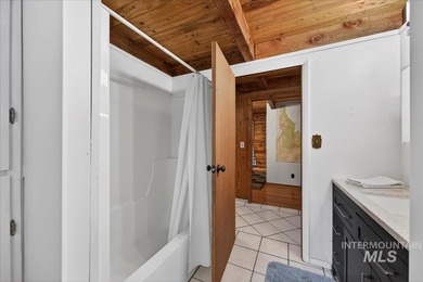 Beautiful 1,244 sq. ft. log home offering 2 bed/1 bath, with on Terrace Lakes Golf Resort in ID - for sale on GolfHomes.com, golf home, golf lot