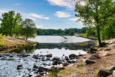 Discover an amazing, wooded lot in the picturesque Lake Royale on River Golf and County Club at Lake Royale in North Carolina - for sale on GolfHomes.com, golf home, golf lot