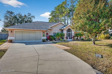 BRAND NEW ROOF! SPARKLING POOL! TWO PRIMARY BEDROOM SUITES! on The Grand Club - Pine Lakes Course in Florida - for sale on GolfHomes.com, golf home, golf lot