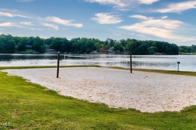 Discover an amazing, wooded lot in the picturesque Lake Royale on River Golf and County Club at Lake Royale in North Carolina - for sale on GolfHomes.com, golf home, golf lot