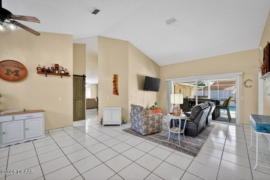 BRAND NEW ROOF! SPARKLING POOL! TWO PRIMARY BEDROOM SUITES! on The Grand Club - Pine Lakes Course in Florida - for sale on GolfHomes.com, golf home, golf lot