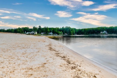 Discover an amazing, wooded lot in the picturesque Lake Royale on River Golf and County Club at Lake Royale in North Carolina - for sale on GolfHomes.com, golf home, golf lot