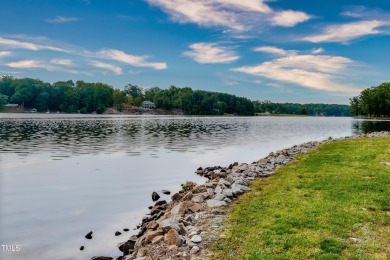 Discover an amazing, wooded lot in the picturesque Lake Royale on River Golf and County Club at Lake Royale in North Carolina - for sale on GolfHomes.com, golf home, golf lot