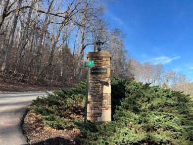 Beautifully wooded Lot located in the upscale community on Chatuge Shores Golf Course in North Carolina - for sale on GolfHomes.com, golf home, golf lot