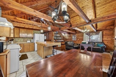 Beautiful 1,244 sq. ft. log home offering 2 bed/1 bath, with on Terrace Lakes Golf Resort in ID - for sale on GolfHomes.com, golf home, golf lot