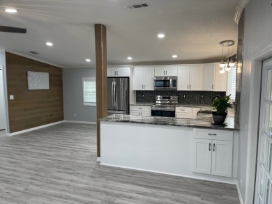 *This home is located in a 55+ resort style leased land on Big Cypress Golf and Country Club in Florida - for sale on GolfHomes.com, golf home, golf lot