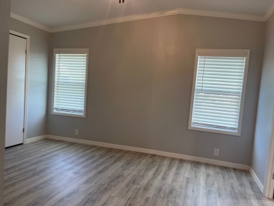 *This home is located in a 55+ resort style leased land on Big Cypress Golf and Country Club in Florida - for sale on GolfHomes.com, golf home, golf lot
