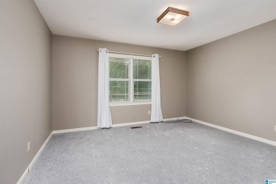Welcome to 5311 Woodhill Circle - a spacious 4-bedroom, 2-bath on Woodland Forrest Country Club in Alabama - for sale on GolfHomes.com, golf home, golf lot