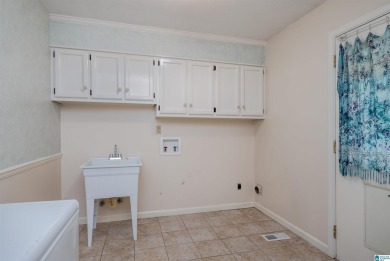 Welcome to 5311 Woodhill Circle - a spacious 4-bedroom, 2-bath on Woodland Forrest Country Club in Alabama - for sale on GolfHomes.com, golf home, golf lot