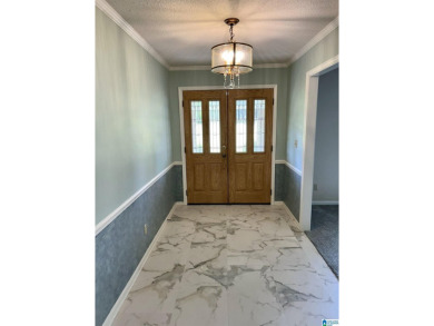 Welcome to 5311 Woodhill Circle - a spacious 4-bedroom, 2-bath on Woodland Forrest Country Club in Alabama - for sale on GolfHomes.com, golf home, golf lot