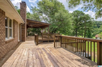 Welcome to 5311 Woodhill Circle - a spacious 4-bedroom, 2-bath on Woodland Forrest Country Club in Alabama - for sale on GolfHomes.com, golf home, golf lot