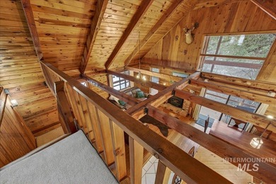 Beautiful 1,244 sq. ft. log home offering 2 bed/1 bath, with on Terrace Lakes Golf Resort in ID - for sale on GolfHomes.com, golf home, golf lot