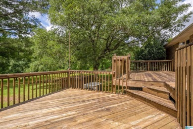 Welcome to 5311 Woodhill Circle - a spacious 4-bedroom, 2-bath on Woodland Forrest Country Club in Alabama - for sale on GolfHomes.com, golf home, golf lot