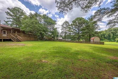 Welcome to 5311 Woodhill Circle - a spacious 4-bedroom, 2-bath on Woodland Forrest Country Club in Alabama - for sale on GolfHomes.com, golf home, golf lot