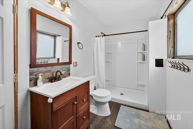 Beautiful 1,244 sq. ft. log home offering 2 bed/1 bath, with on Terrace Lakes Golf Resort in ID - for sale on GolfHomes.com, golf home, golf lot