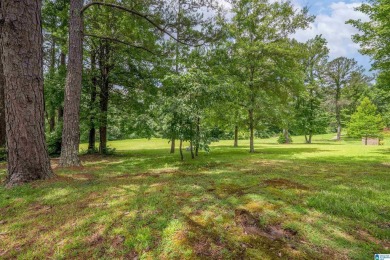 Welcome to 5311 Woodhill Circle - a spacious 4-bedroom, 2-bath on Woodland Forrest Country Club in Alabama - for sale on GolfHomes.com, golf home, golf lot