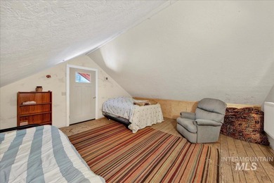 Beautiful 1,244 sq. ft. log home offering 2 bed/1 bath, with on Terrace Lakes Golf Resort in ID - for sale on GolfHomes.com, golf home, golf lot