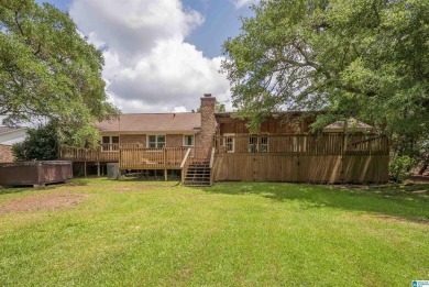 Welcome to 5311 Woodhill Circle - a spacious 4-bedroom, 2-bath on Woodland Forrest Country Club in Alabama - for sale on GolfHomes.com, golf home, golf lot