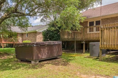 Welcome to 5311 Woodhill Circle - a spacious 4-bedroom, 2-bath on Woodland Forrest Country Club in Alabama - for sale on GolfHomes.com, golf home, golf lot