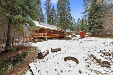 Beautiful 1,244 sq. ft. log home offering 2 bed/1 bath, with on Terrace Lakes Golf Resort in ID - for sale on GolfHomes.com, golf home, golf lot