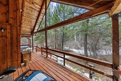 Beautiful 1,244 sq. ft. log home offering 2 bed/1 bath, with on Terrace Lakes Golf Resort in ID - for sale on GolfHomes.com, golf home, golf lot