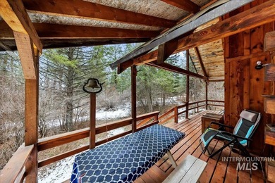 Beautiful 1,244 sq. ft. log home offering 2 bed/1 bath, with on Terrace Lakes Golf Resort in ID - for sale on GolfHomes.com, golf home, golf lot