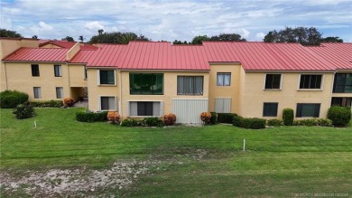 First Floor 1/1.5 Condo with Golf Course View. Check out this on Miles Grant Country Club in Florida - for sale on GolfHomes.com, golf home, golf lot
