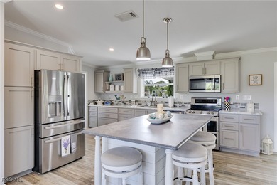 Welcome to 19440 Pony Lane, a beautifully updated home perfectly on Lake Fairways Country Club in Florida - for sale on GolfHomes.com, golf home, golf lot