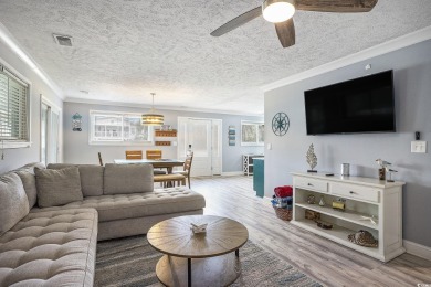 This fully furnished, turn-key 3-bedroom, 2-bath home with No on Tidewater Golf Club and Plantation in South Carolina - for sale on GolfHomes.com, golf home, golf lot