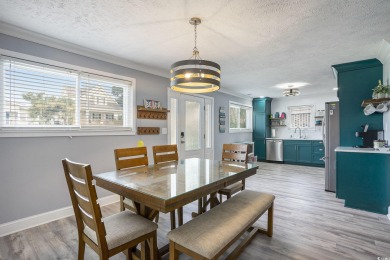 This fully furnished, turn-key 3-bedroom, 2-bath home with No on Tidewater Golf Club and Plantation in South Carolina - for sale on GolfHomes.com, golf home, golf lot