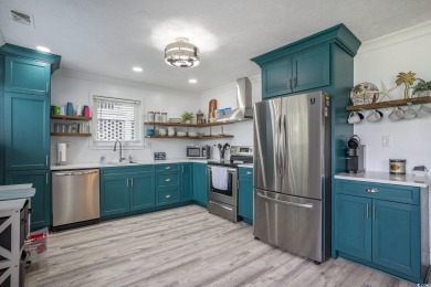 This fully furnished, turn-key 3-bedroom, 2-bath home with No on Tidewater Golf Club and Plantation in South Carolina - for sale on GolfHomes.com, golf home, golf lot