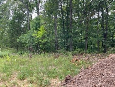 Enjoy this beautiful .31 acre corner lot that is nestled in on Bella Vista Country Club - Kingswood in Arkansas - for sale on GolfHomes.com, golf home, golf lot