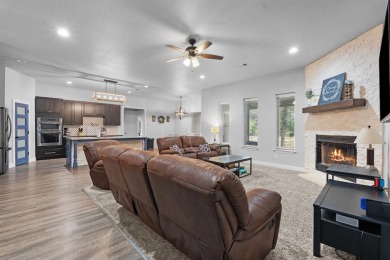 This spacious home boasts an open floor plan, oversized rooms on Sugar Tree Golf and Country Club in Texas - for sale on GolfHomes.com, golf home, golf lot