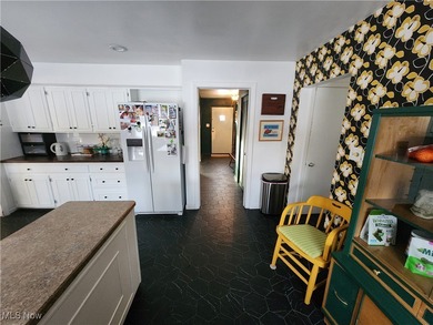 Welcome to this beautiful Colonial-style home ideally located on Henry Stambaugh Golf Course in Ohio - for sale on GolfHomes.com, golf home, golf lot