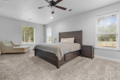 This spacious home boasts an open floor plan, oversized rooms on Sugar Tree Golf and Country Club in Texas - for sale on GolfHomes.com, golf home, golf lot