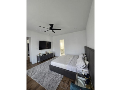 Welcome to 1412 Morris Crossing, a stunning modern home located on Heath Golf and Yacht Club in Texas - for sale on GolfHomes.com, golf home, golf lot