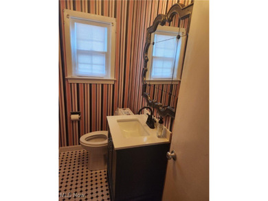 Welcome to this beautiful Colonial-style home ideally located on Henry Stambaugh Golf Course in Ohio - for sale on GolfHomes.com, golf home, golf lot