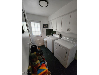 Welcome to this beautiful Colonial-style home ideally located on Henry Stambaugh Golf Course in Ohio - for sale on GolfHomes.com, golf home, golf lot