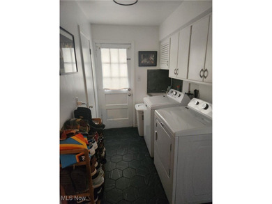 Welcome to this beautiful Colonial-style home ideally located on Henry Stambaugh Golf Course in Ohio - for sale on GolfHomes.com, golf home, golf lot