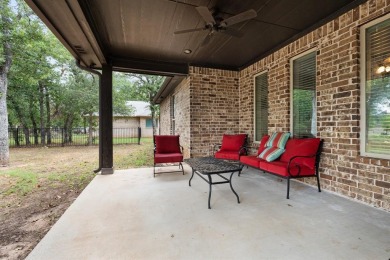 This spacious home boasts an open floor plan, oversized rooms on Sugar Tree Golf and Country Club in Texas - for sale on GolfHomes.com, golf home, golf lot