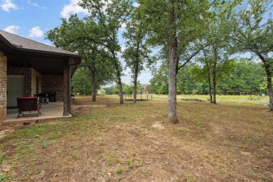 This spacious home boasts an open floor plan, oversized rooms on Sugar Tree Golf and Country Club in Texas - for sale on GolfHomes.com, golf home, golf lot