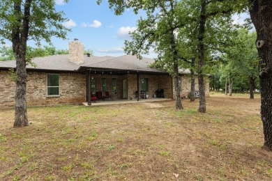 This spacious home boasts an open floor plan, oversized rooms on Sugar Tree Golf and Country Club in Texas - for sale on GolfHomes.com, golf home, golf lot