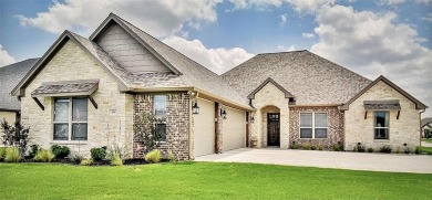 Located in the gorgeous Harbor Lakes gated golf course community on Harbor Lakes Golf Club in Texas - for sale on GolfHomes.com, golf home, golf lot