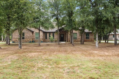 This spacious home boasts an open floor plan, oversized rooms on Sugar Tree Golf and Country Club in Texas - for sale on GolfHomes.com, golf home, golf lot