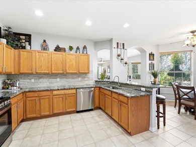 Situated within the gates of Heron Creek Golf & Country Club on Heron Creek Golf and Country Club in Florida - for sale on GolfHomes.com, golf home, golf lot