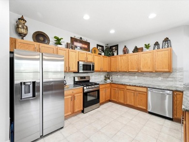 Situated within the gates of Heron Creek Golf & Country Club on Heron Creek Golf and Country Club in Florida - for sale on GolfHomes.com, golf home, golf lot