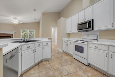 This beautifully landscaped 4-bedroom, 3-bath is an all-brick on The Golf Club At Summerbrooke in Florida - for sale on GolfHomes.com, golf home, golf lot